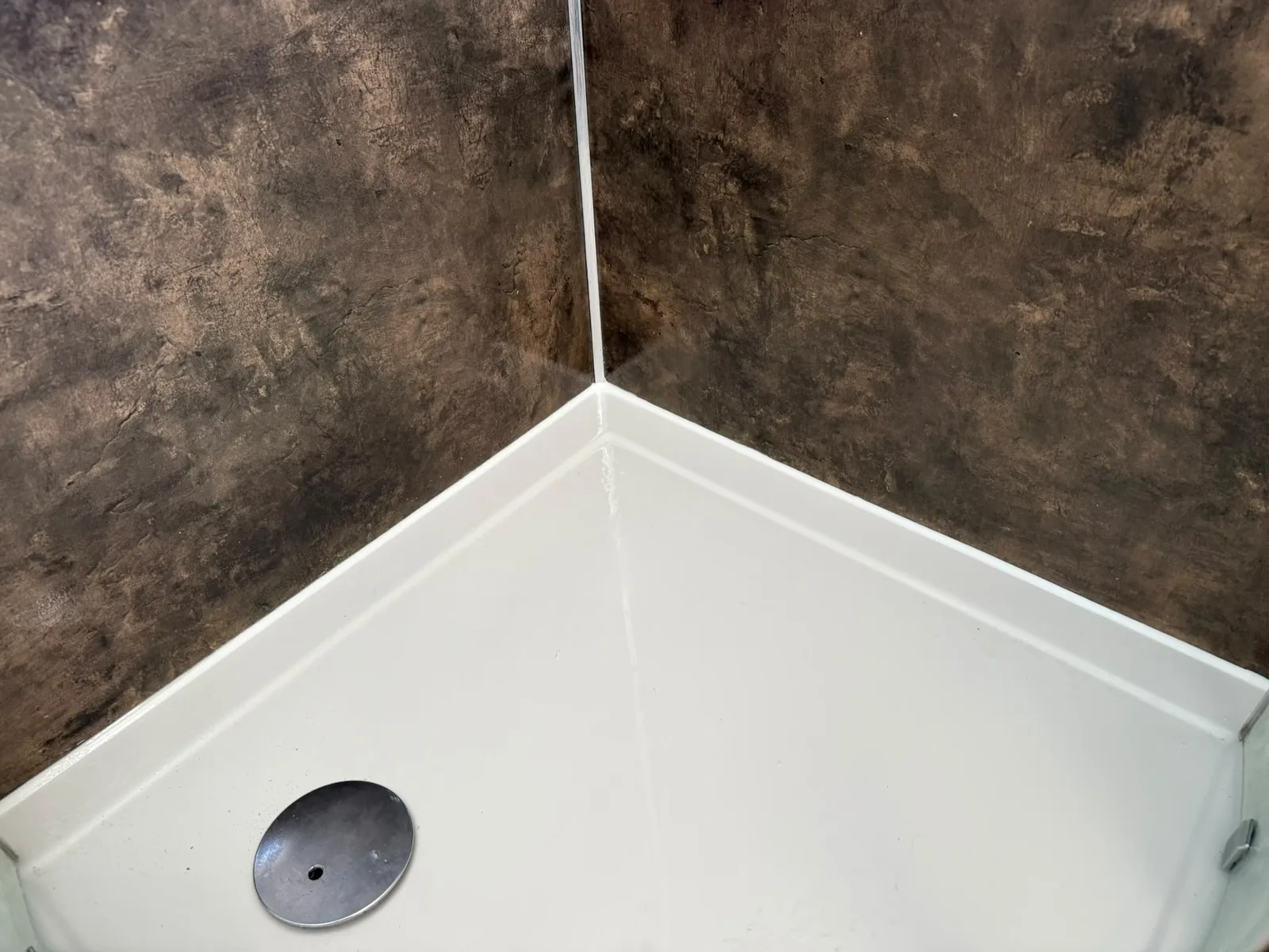 Shower tray and wall finish completed by HB Group